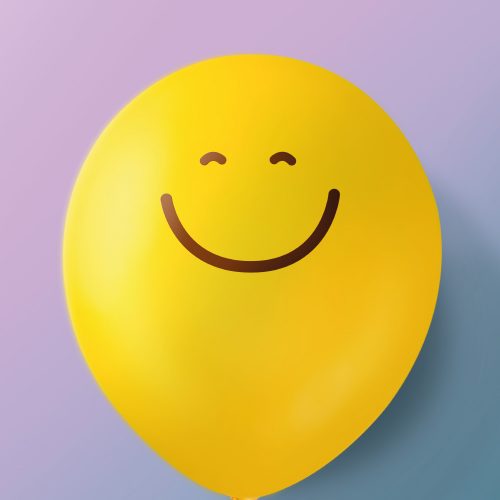 Smiling yellow balloon